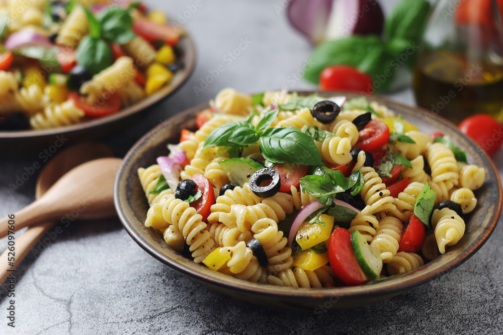 A bowl with traditional Italian pasta salad A bowl with traditional Italian pasta salad
