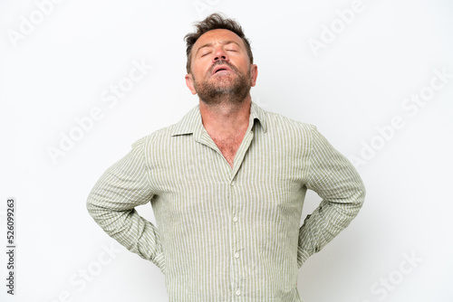 Middle age caucasian man isolated on white background suffering from backache for having made an effort