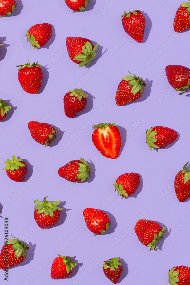 Fresh red strawberry isolated on purple background, top view. Strawberry seamless pattern Fresh red strawberry isolated on purple background, top view. Strawberry seamless pattern