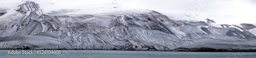 Panorama of snow covered mountains at Deception Island, Antarctica