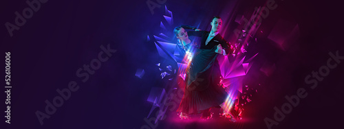 Foto Poster, flyer with graceful young couple dancing ballroom dance over dark background with colorful neon elements