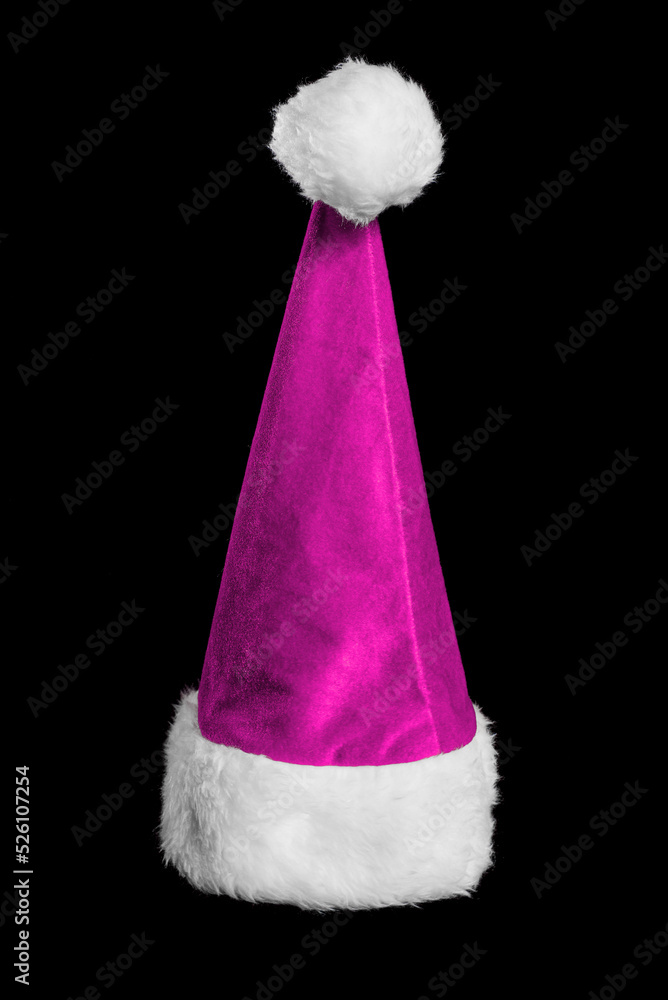 Burgundy New Year's hat of Santa Claus isolated on a black background. Pink Christmas cap Burgundy New Year's hat of Santa Claus isolated on a black background. Pink Christmas cap