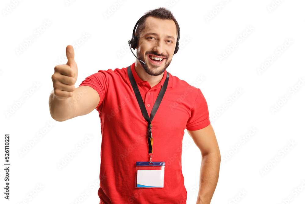 Male dispatcher wearing a headset with hands free microphone and gesturing thumbs up Male dispatcher wearing a headset with hands free microphone and gesturing thumbs up