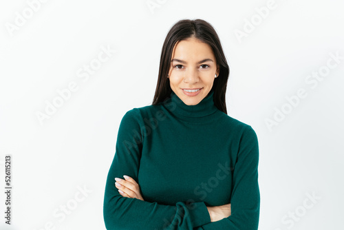 Confident calm young brunette woman wearing turtleneck © progressman