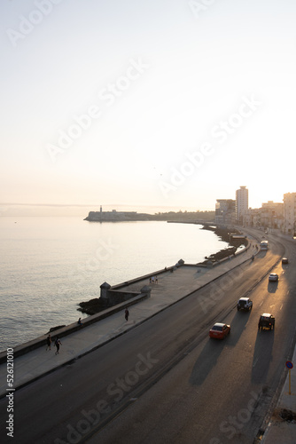 Malecon, La Havana in the morning. View from a terrace of the Malecon waterfront at dawn. Cuba in the morning on the Malecon. Caribbean tour on the Cuban island with a view in La Havana.