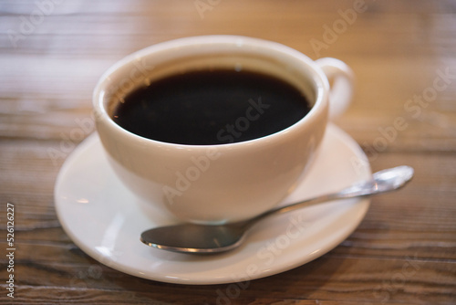 Fototapeta Naklejka Na Ścianę i Meble -  cup of coffee on wooden table