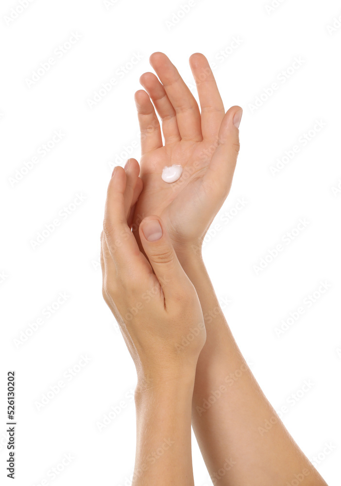 Woman applying cream on hand against white background, closeup Woman applying cream on hand against white background, closeup