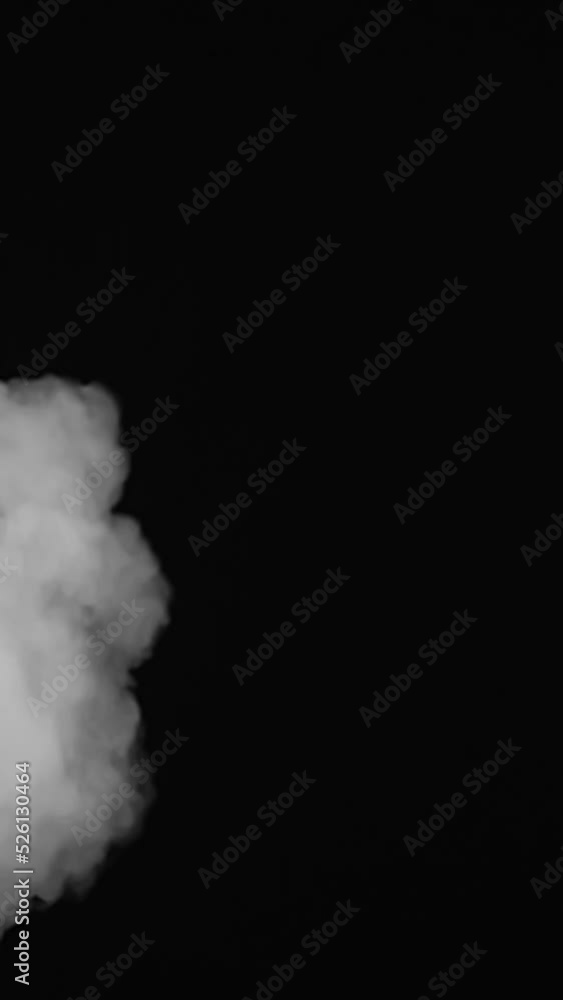 white smoke swirls on a black background vertical mobile video white smoke swirls on a black background vertical mobile video
