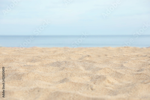 Closeup view of sandy beach near sea