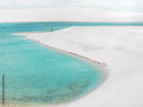  white sand dunes of Lencois Maranhenses with blue water pools photo