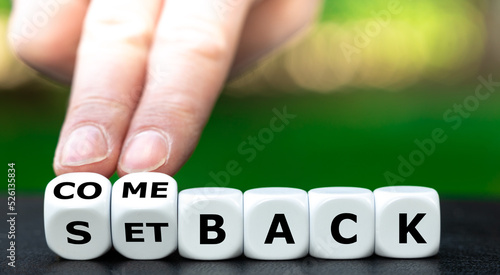 Hand tuns dice and changes the expression "setback" to "comeback".