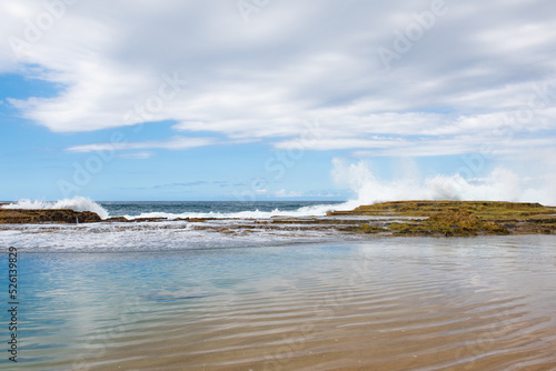 Waves crashing on the beach