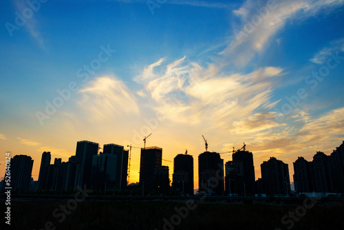 city skyline at sunset © may