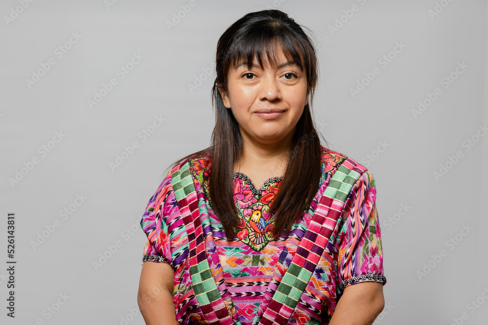 Portrait of Mayan woman with typical costume - Hispanic young woman with colorful traditional clothes on white background - Hispanic young woman Portrait of Mayan woman with typical costume - Hispanic young woman with colorful traditional clothes on white background - Hispanic young woman