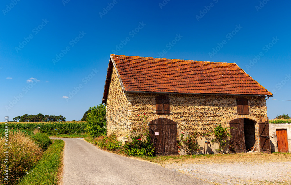 View of typical farmhouse in the landes countryside along Le Puy Route, France View of typical farmhouse in the landes countryside along Le Puy Route, France