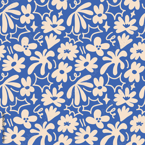 Abstract seamless pattern with cute hand drawn meadow flowers. Stylish natural background. Hand drawn design elements.