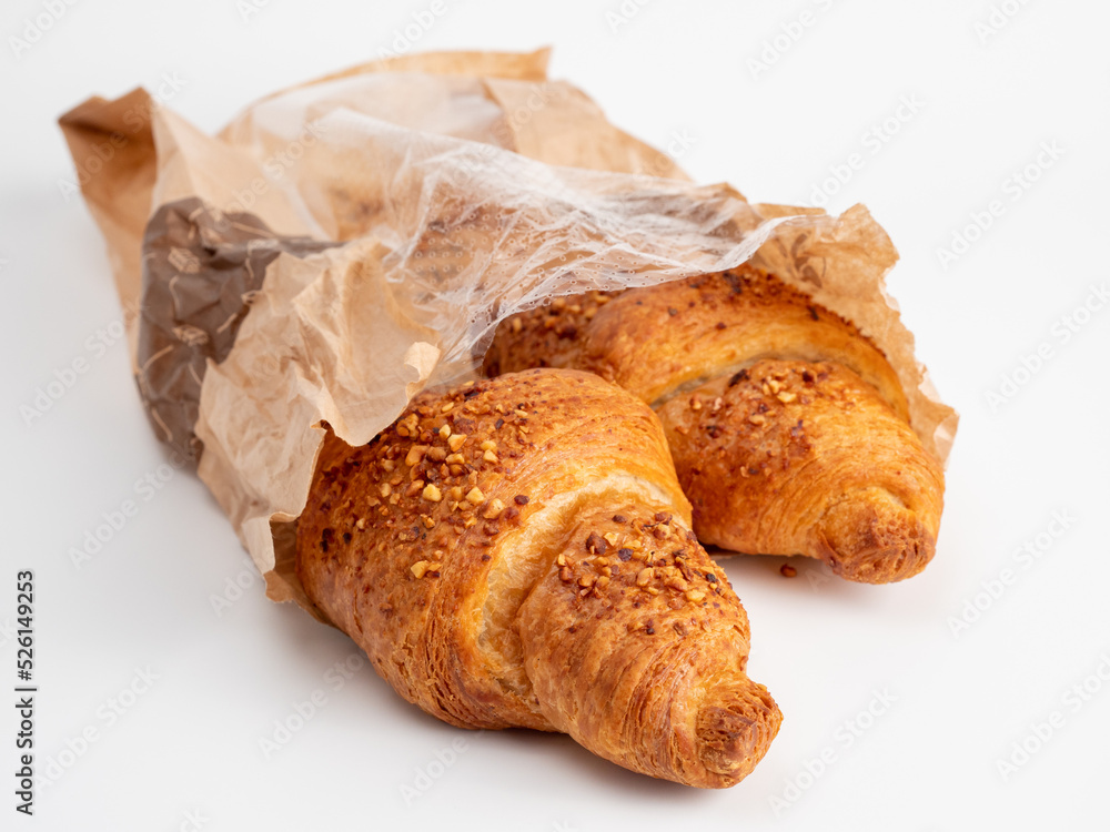 Baked goods croissant on a white background. Baked goods croissant on a white background.