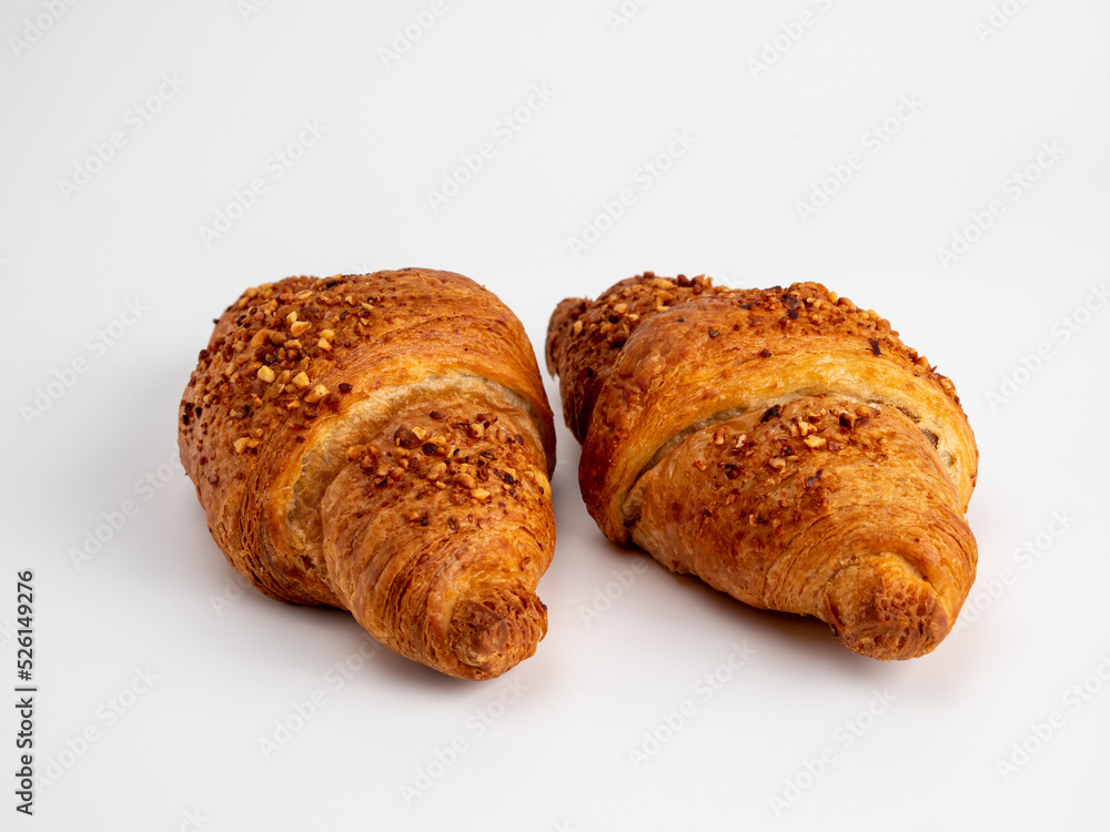 Baked goods croissant on a white background. Baked goods croissant on a white background.