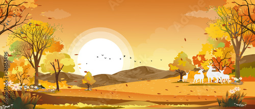 Fantasy panorama landscapes of Countryside in autumn,Panoramic of mid autumn with farm field, mountains, wild grass and leaves falling from trees in yellow foliage. Wonderland landscape in fall season