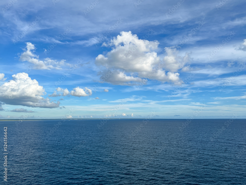 A view of a sunny day on the Caribbean Sea from a cruise ship.