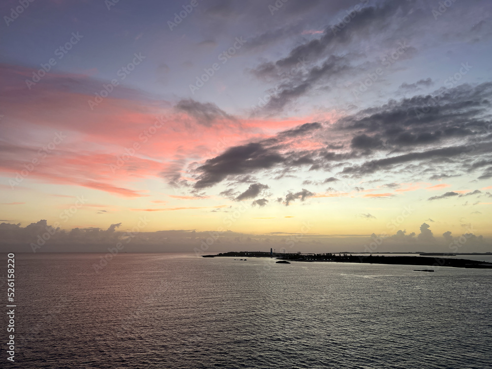 The orange, pink and blue sunrise in the Berry Islands, Bahamas.