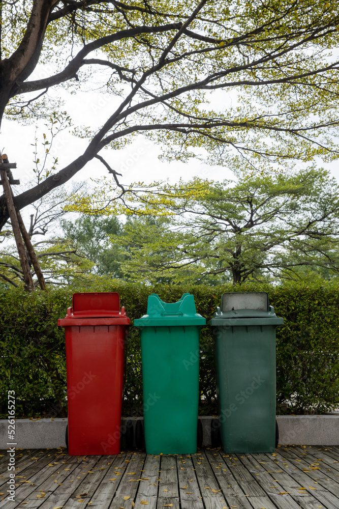 Garbage bin in public park. colorful trash bin. wheelie bin for rubbish, Public trash background Garbage bin in public park. colorful trash bin. wheelie bin for rubbish, Public trash background