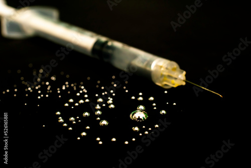 drops of metallic liquid mercury