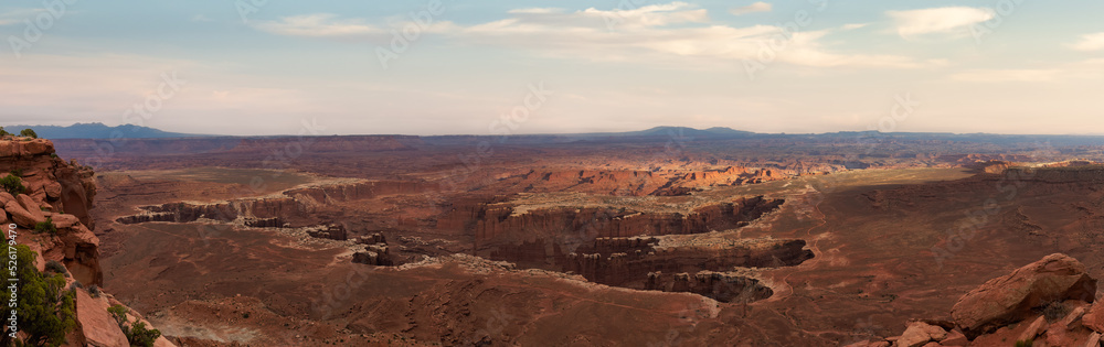 Scenic Panoramic View of American Landscape and Red Rock Mountains in Desert Canyon. Colorful Sunset Sky Art Render. Canyonlands National Park. Utah, United States. Nature Background Panorama