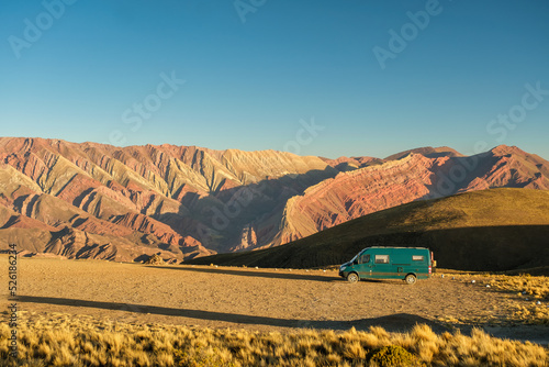 Campervan in the Serrania del Hornocal in Jujuy, Argentina at sunset.