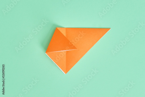 Free Download Origami Bear. Step-by-step photo instruction on a green background. DIY concept. Step4.  - GFXLoad
