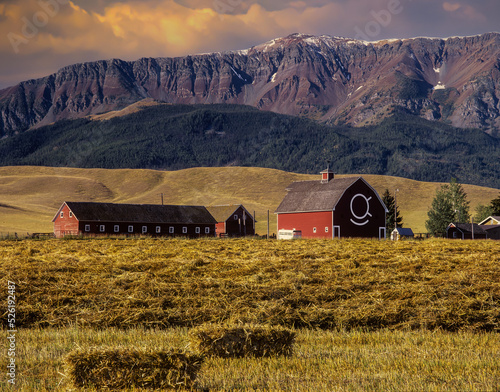 Red barn and hay field in Wallowa County, near Joseph, Oregon photo