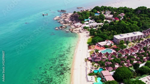 koh samui island at thailand, Lamai beach. Aerial drone view of the coast line with green beautiful unique ocean water  sunny day Grandfather and Grandmother Rocks (Hin Ta Hin Yai) photo