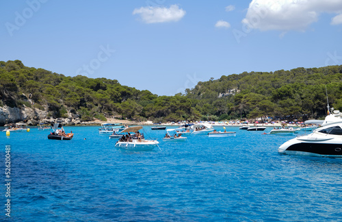 Menorca, Spain: Beautiful bay with sailing boat catamaran © Matteo