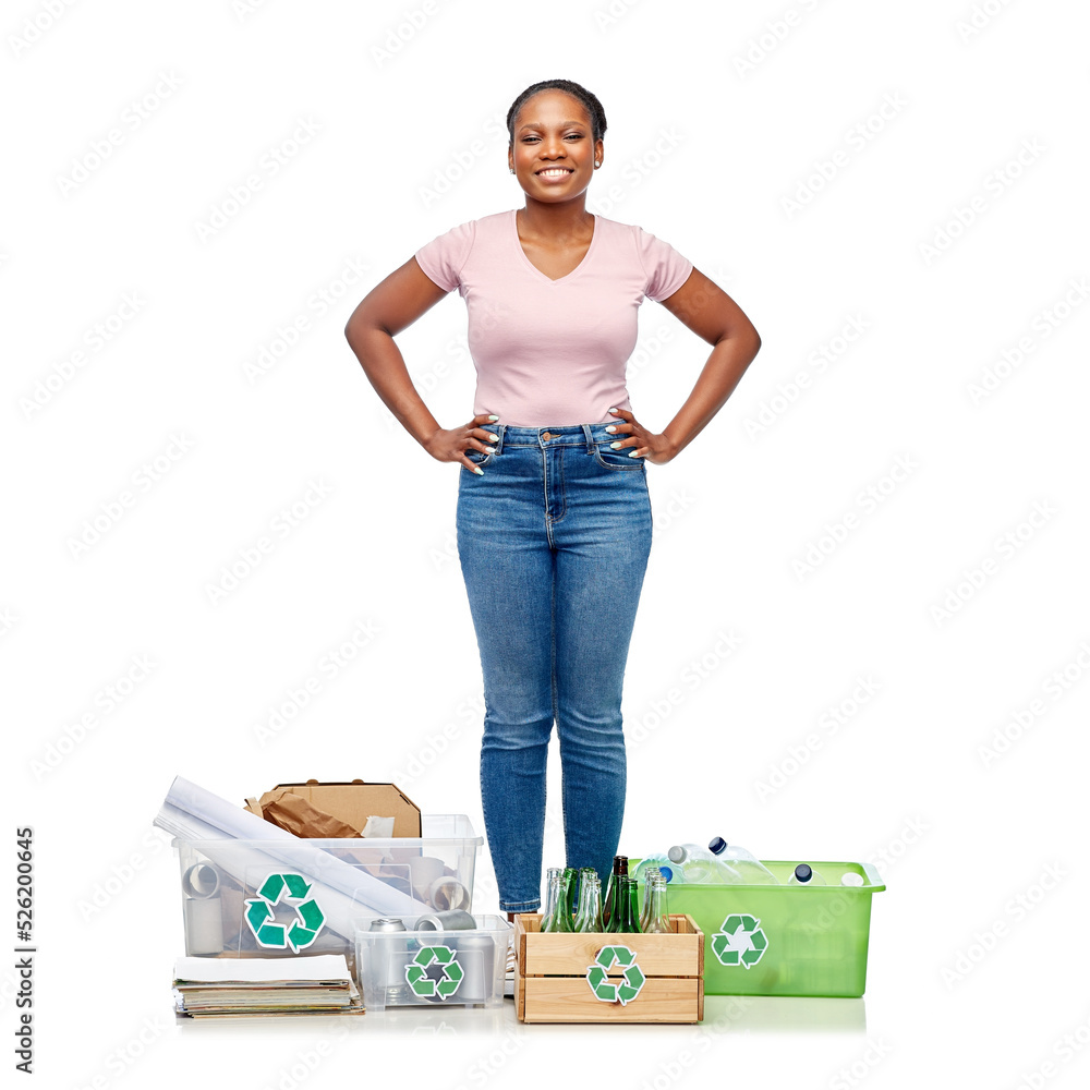 recycling, waste sorting and sustainability concept - smiling young african american woman with plastic and glass bottles, papers and metal tin cans in boxes over white background recycling, waste sorting and sustainability concept - smiling young african american woman with plastic and glass bottles, papers and metal tin cans in boxes over white background