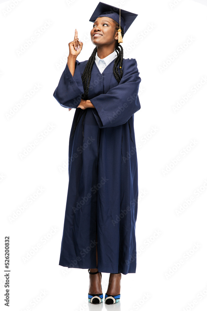 © Syda Productions - education, graduation and people concept - happy graduate student woman in mortarboard and bachelor gown pointing finger up over white background © Syda Productions - education, graduation and people concept - happy graduate student woman in mortarboard and bachelor gown pointing finger up over white background