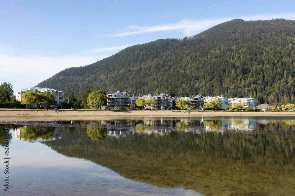 Vacation Homes by the lake and sandy beach. Sunny Summer Morning. Harrison Hot Springs, British Columbia, Canada.