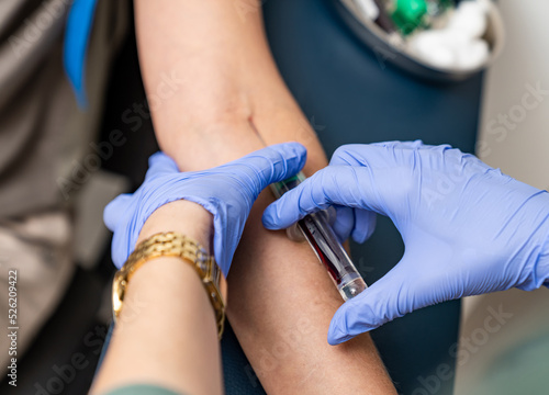 Medical professional taking blood samples. Blood taking for test.