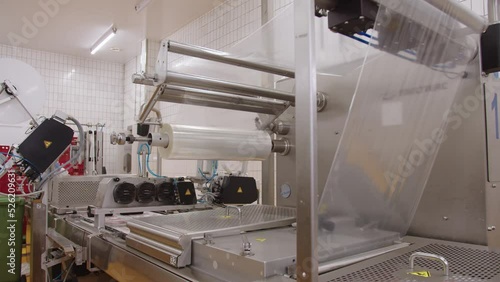 Sealing products in sewn-on polyethylene film on industrial machine