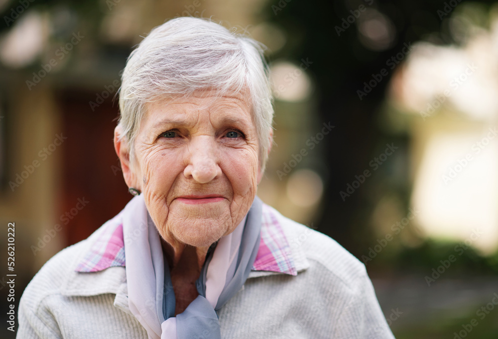 Portrait of elderly woman smiling happy enjoying day in park Portrait of elderly woman smiling happy enjoying day in park