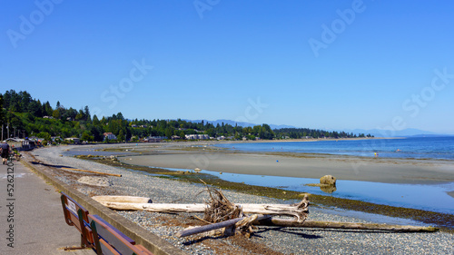 Beach stroll at the town of Qualicum Beach, BC, on a bright mid-summer day. photo