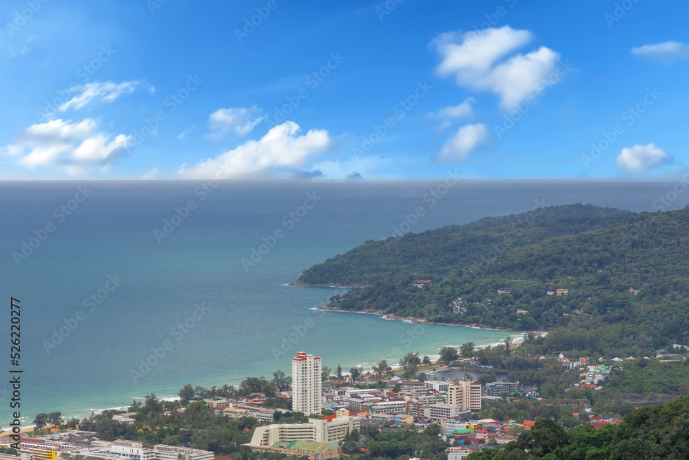 Karon Beach in Phuket Thailand, turquoise blue waters, lush green mountains colourful skies. Phuket is a tropical island many palms Karon Beach in Phuket Thailand, turquoise blue waters, lush green mountains colourful skies. Phuket is a tropical island many palms