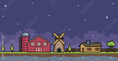 Pixel art farm landscape at night with house, barn, silo and mill 8bit game background photo