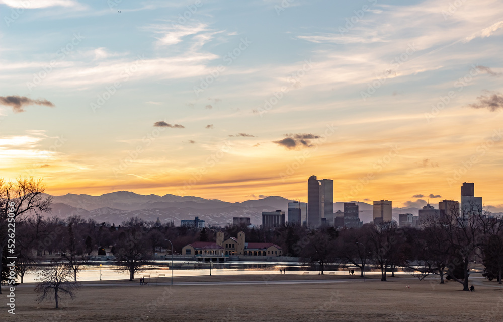 City buildings skyline view and golden sunset at Denver Colorado City Park