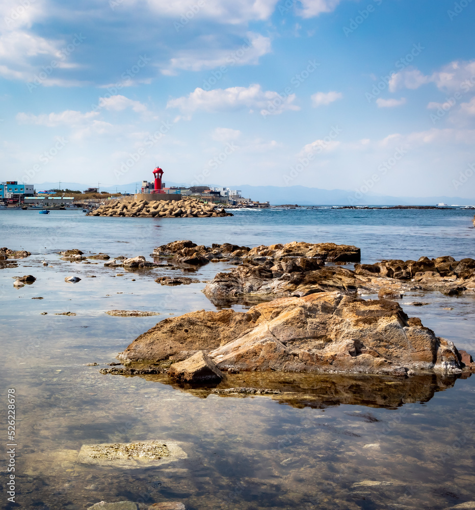 Red lighthouse and rocky coastline of Pohang South Korea