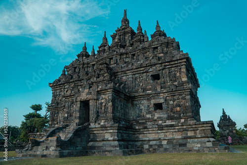 Plaosan Temple, a Buddhist temple relic of the ancient Mataram kingdom with a magnificent building and still very clean with a blue sky background © Yasuspade