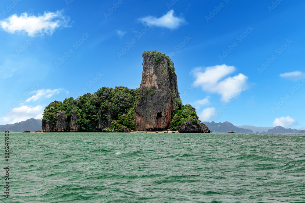 Obraz premium Island Phuket Thailand. Lovely rock in the middle of the ocean surrounded by mountains