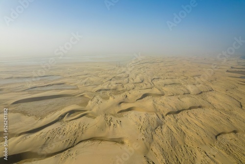 Vast landscape of Sealine Desert and Sand Dunes in Qatar photo