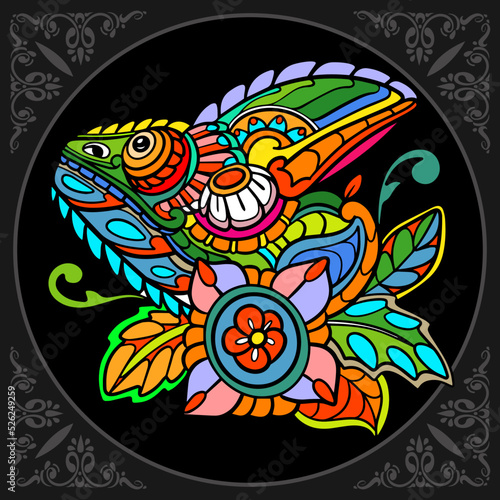 Colorful chameleon head isolated on black background