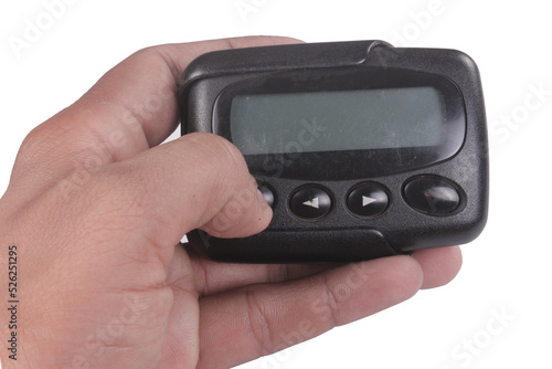 Old pager device isolate on white background photo