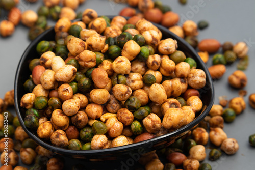 Cocktail Mix Namkeen Mixture Also Called Tedhe Medhe Chakhna Made Of Mixed Nuts Like Kabuli Chana Mungfali Hara Matar Kabli Channa And Moongfali Badam photo